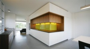 linear, light kitchen, lacquered, wood & glass with separated functional elements. Design: Kaell Architect